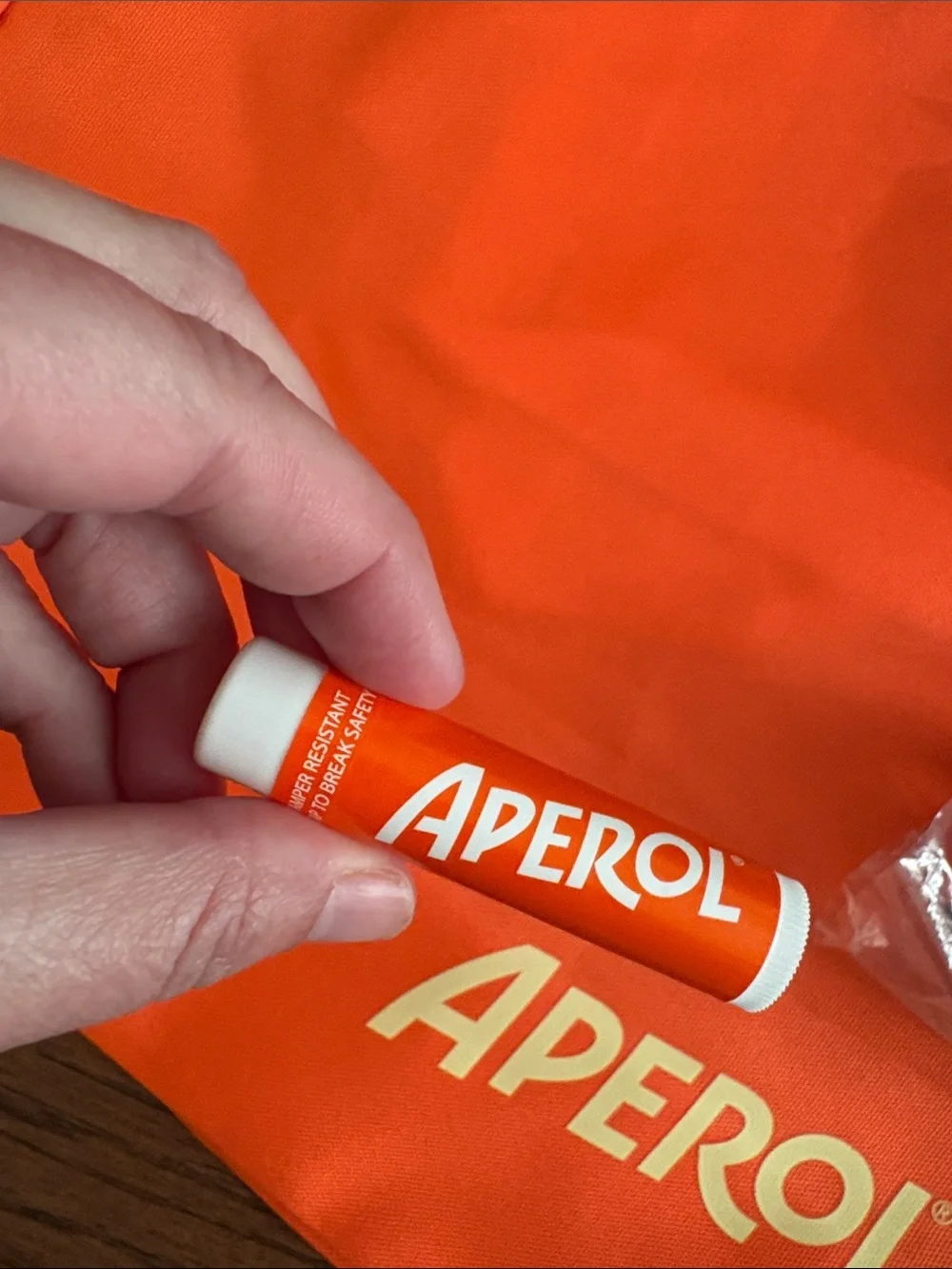 Aperol Beach Kit Orange Tote Bag, two sunglasses 🕶️, chapstick